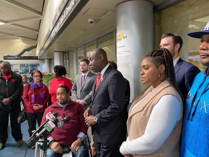 Kendrick Hudson's father Leon Hudson, lawyer Ben Crump, and mother Erika Vernon speak at Charlotte Douglas Airport