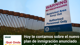 En la imagen se puede observar una fotografia de la frontera de los Estados Unidos y Mexico.  En el lado inferior de la imagen esta el logo de Que Onda Michigan sobre un fondo blanco. En la parte derecha las siguientes palabras estan escritas: "Hoy te contamos sobre el nuevo plan de inmigracion anunciado por el presidente Biden." En el lado superior de la imagen se encuentra las pablaras "WKAR" en color blanco.  y "Episodio 76".