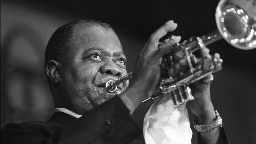 Louis Armstrong during a concert in Paris, June 1965.