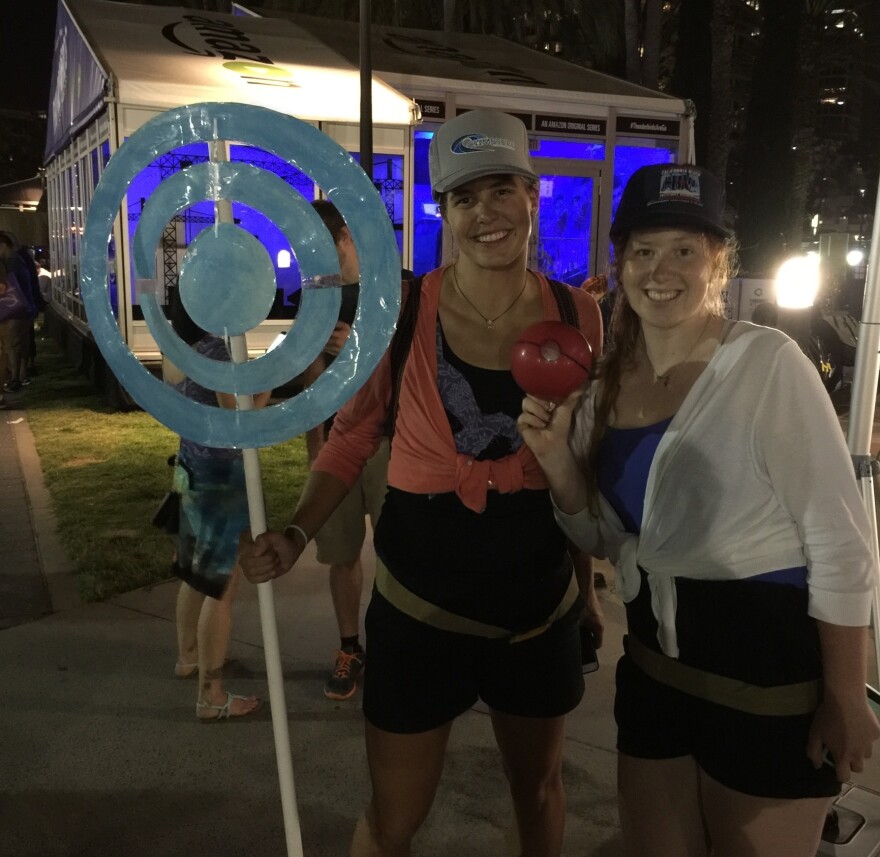 Sisters Gretchen and Samantha Cash and their home-made PokéStop.