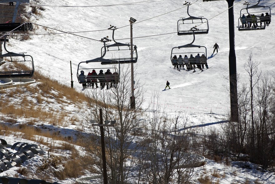 File-In this Jan.14,2012 file photo skiers make their way up the slopes near uncovered terrain at Park City Mountain Resort in Park City, Utah, One of the nation's premier ski resorts in a state that proclaims to have the "greatest snow on earth" says it might have to shut down after its lease on the sprawling property has expired. (AP Photo/Jim Urquhart,File)