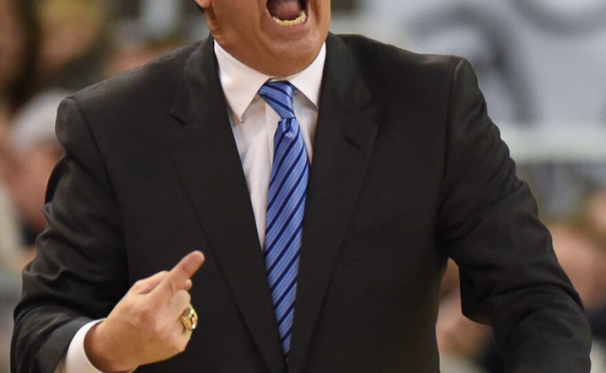 Not happy with his team's play during the first half, Kentucky coach John Calipari shows some frustration. (Greenberry Taylor/WUFT News)