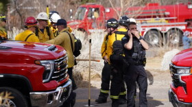 Firefighters and law enforcement get ready to work the Bluebell fire Saturday, Feb. 28, 2026, near Boulder.