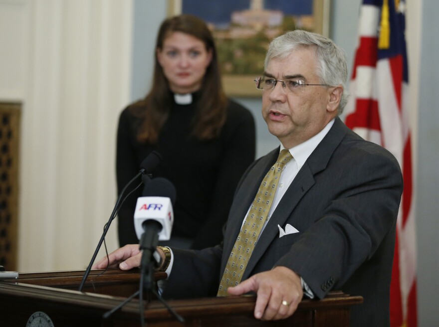 State Sen. Brian Crain, R-Tulsa, speaks at a news conference in Oklahoma City, Wednesday, Aug. 3, 2016. At left is Rev. Lori Walke, Mayflower Congregational United Church of Christ. 