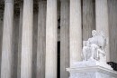 The Guardian of Law scuplture is seen at the west entrance of the Supreme Court on Thursday, Feb. 22, 2024, in Washington.