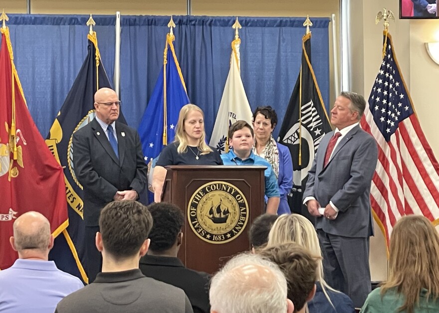 Ravena-Coeymans-Selkirk middle schooler Wyatt Bunce and his mom Amanda Reed speak at a press conference at the Albany County Office Building on Tuesday, April 14, 2026.
