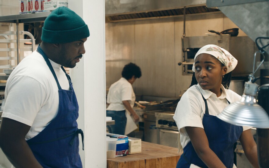 Lionel Boyce as Marcus and Ayo Edebiri as Sydney on the new FX show <em>The Bear. </em>