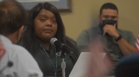 Peoria County Auditor Jessica Thomas reads a prepared statement during the public comment portion of Thursday's county board meeting.