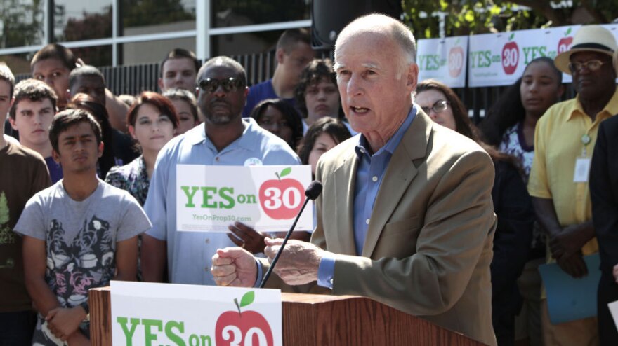 California Gov. Jerry Brown, speaking in Sacramento on Wednesday, advocates a ballot initiative that would increase sales and income taxes. Several states have measures on the November ballot that seek to plug deficits by raising taxes.