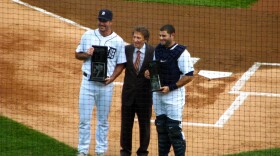 Mike Ilitch (center) with Tigers pitcher Justin Verlander (right) and Alex Avila (left) in 2011.