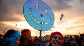 During times of financial stress, political division and even war, what is the relevance of happiness? 
 (Leon NealL/AFP via Getty Images)