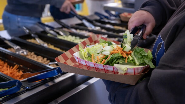 Students get lunch at the Tres Volcanes Community Collaborative School in Albuquerque on Tuesday.