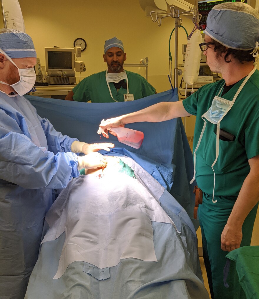 Doctors participate in a simulation at the CyberMed Summit. 