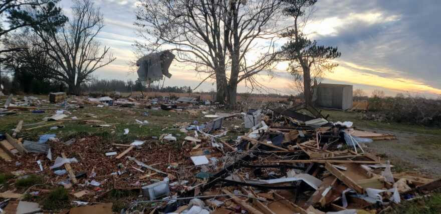 Debris is scattered across a field in Briensburg, Kentucky, following storms last weekend through four states.  