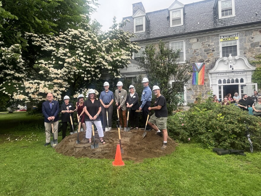 Massachusetts Representative Jim McGovern [farthest left], members of the Jones Library Board of Trustees and Jones Library director, Sharon Sharry [center] at a ceremonial groundbreaking with shovels on Wednesday, June 18th to commemorate the expansion project's start.