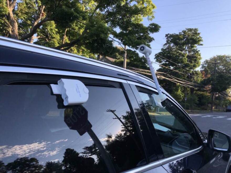 Temperature and air quality sensors attached to Carolyn Martin's car.