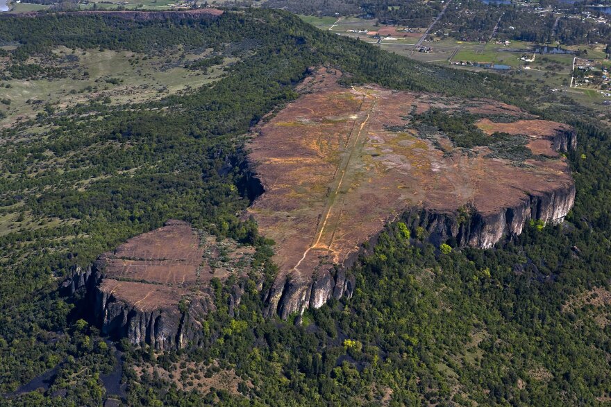 An aerial view of Table Rocks in the Rogue Valley. This iconic formation is co-managed by the Bureau of Land Management and the Nature Conservancy and is among the conservancy's sites to officially reopen for public use on April 1.