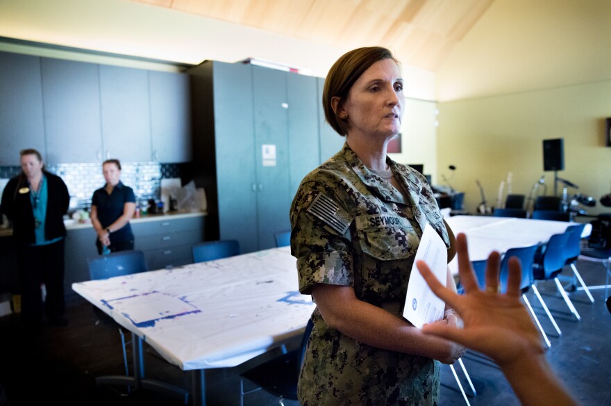 Navy Capt. Mary Seymour, commanding officer at Naval Support Activity Bethesda, is interviewed about the closure of the bowling center, which has angered many veterans who used the alley for medical recreation therapy.