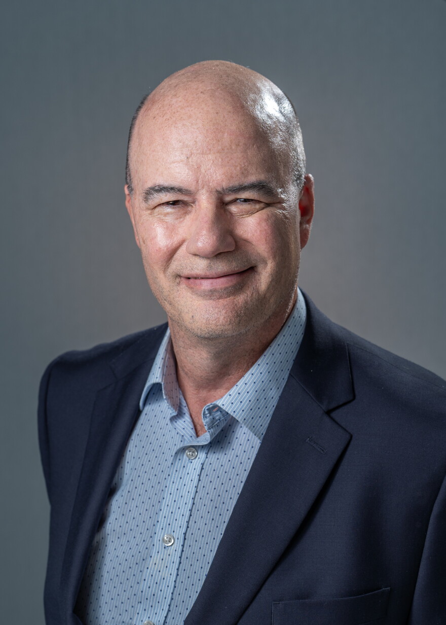 Headshot of reporter James Pilcher.