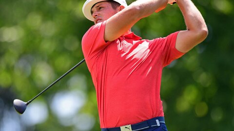 Bryson DeChambeau follows his tee shot on the 18th hole during the final round of the Memorial golf tournament Sunday, June 3, 2018, in Dublin.
