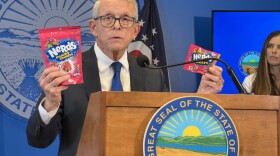 Gov. Mike DeWine with Nerds Gummy Clusters and delta-8 THC that mimics Nerds Gummy Clusters in October 2025.