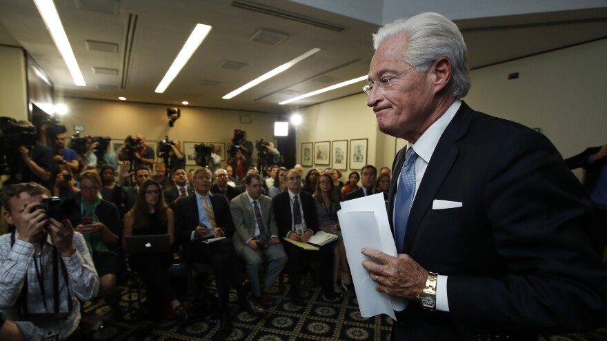 Marc Kasowitz, Trump's personal attorney, leaves a packed room at the National Press Club in Washington on Thursday, after disputing the testimony of Comey earlier that day.