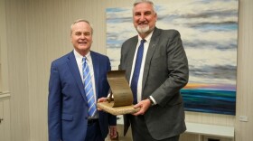 Clay Robbins, left, is the 2024 Sachem Award honoree, the eighth and final recipient to be honored with the award under Gov. Eric Holcomb.