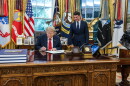 U.S. Representative Rob Bresnahan Jr. joins President Donald J. Trump as he signs an executive order reversing the Obama-era executive order that they say created the “rain tax."