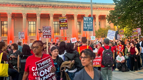 Yale's unionized clerical and technical workers rally on Yale’s Bienecke Plaza ahead of contract resettlement October 15, 2026 in New Haven, Connecticut.
