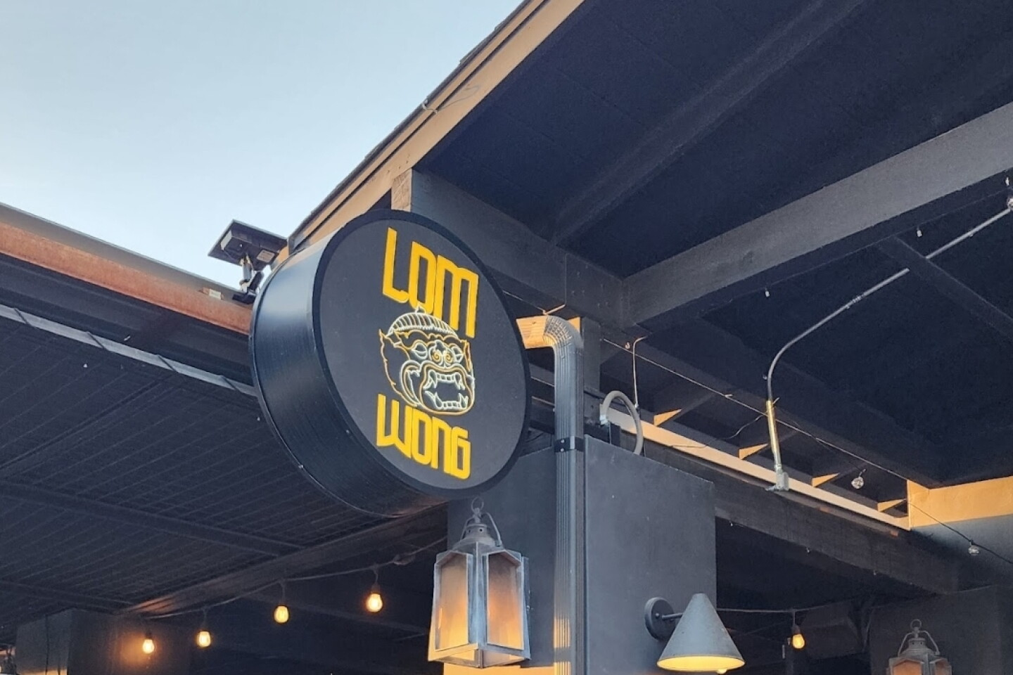 yellow and black Lom Wong sign in downtown Phoenix.