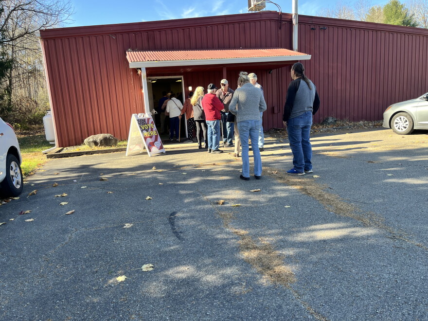 Tunkhannock Township residents wait to vote outside the municipal building on Election Day 2024.
