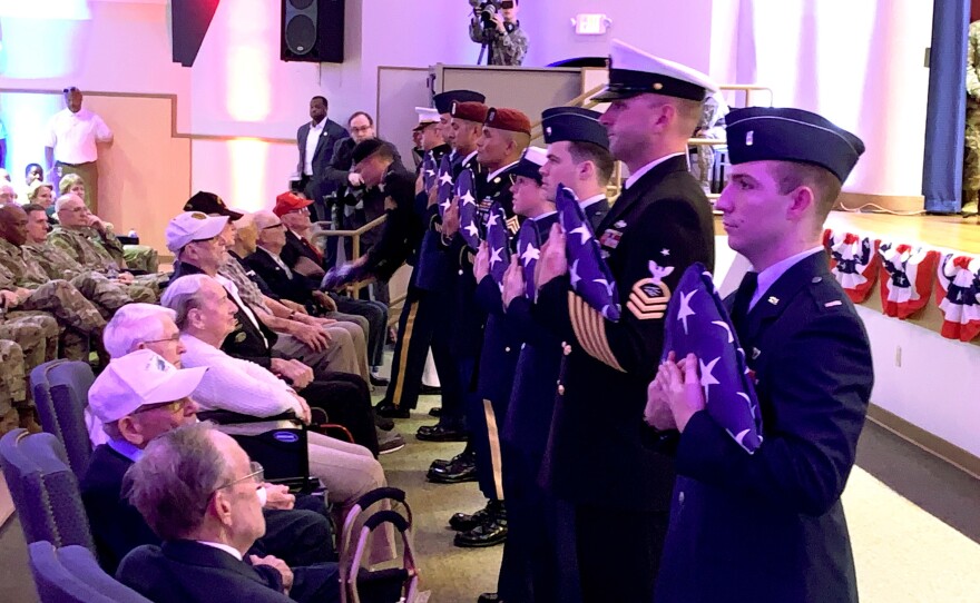 Members of the Air Force presented each of the nine WWII veterans with folded American flags. There were eight men and one woman.