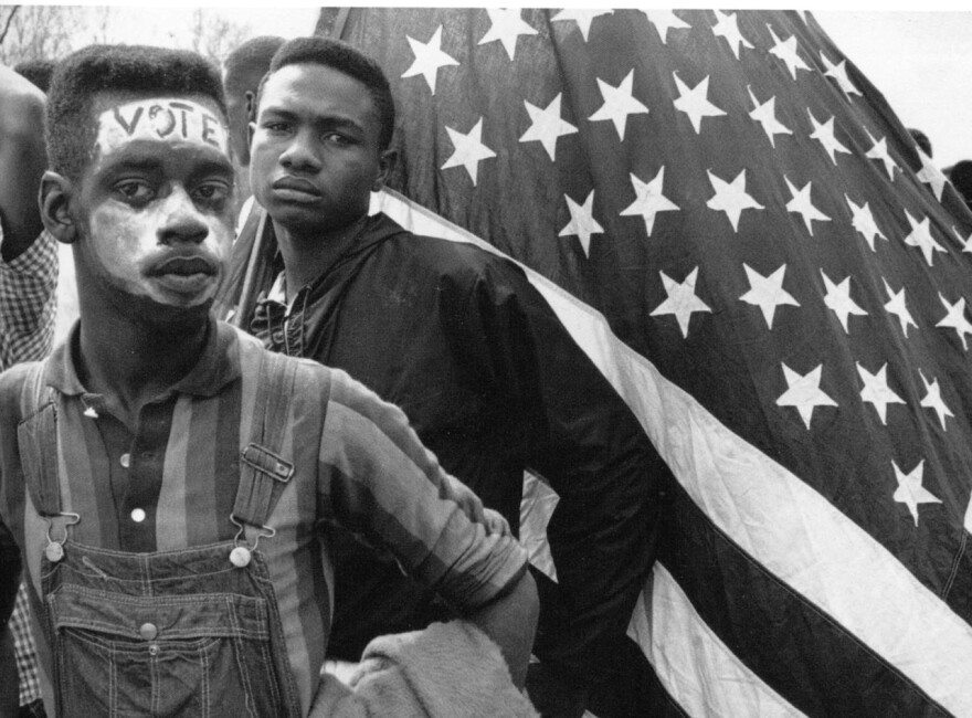 Photo: Two teens in 1962 with an American flag