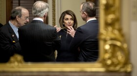 House Speaker Nancy Pelosi speaks with House Intelligence Committee Chairman Adam Schiff (right), House Foreign Affairs Committee Chairman Eliot Engel (left) and House Ways and Means Committee Chairman Richard Neal after the House voted to impeach President Trump on Dec. 18.