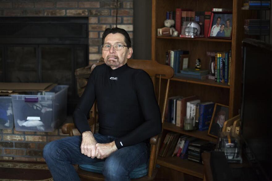 Cancer survivor Jim Nace poses in his Ballwin, Missouri, home.
