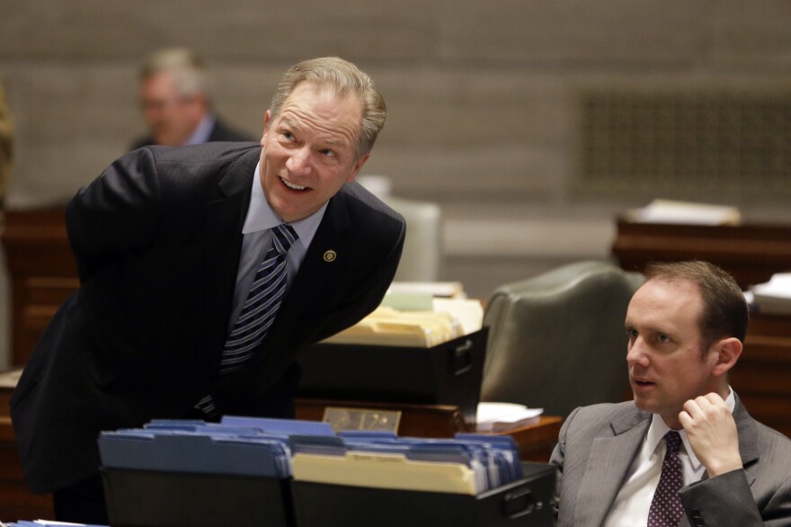 State Sen. Bob Onder (left), a Republican, talks with fellow Sen. Scott Sifton, a Democrat, on March 31 in Jefferson City. Onder, sponsor of the so-called religious freedom bill, says no one from the business community expressed opposition to the bill until mid-February.