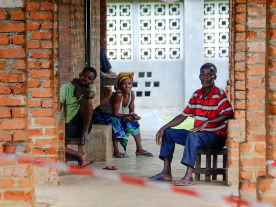 On May 13, people suspected of having the Ebola virus wait at a treatment center in the village of Bikoro, where the outbreak began in the Democratic Republic of the Congo.