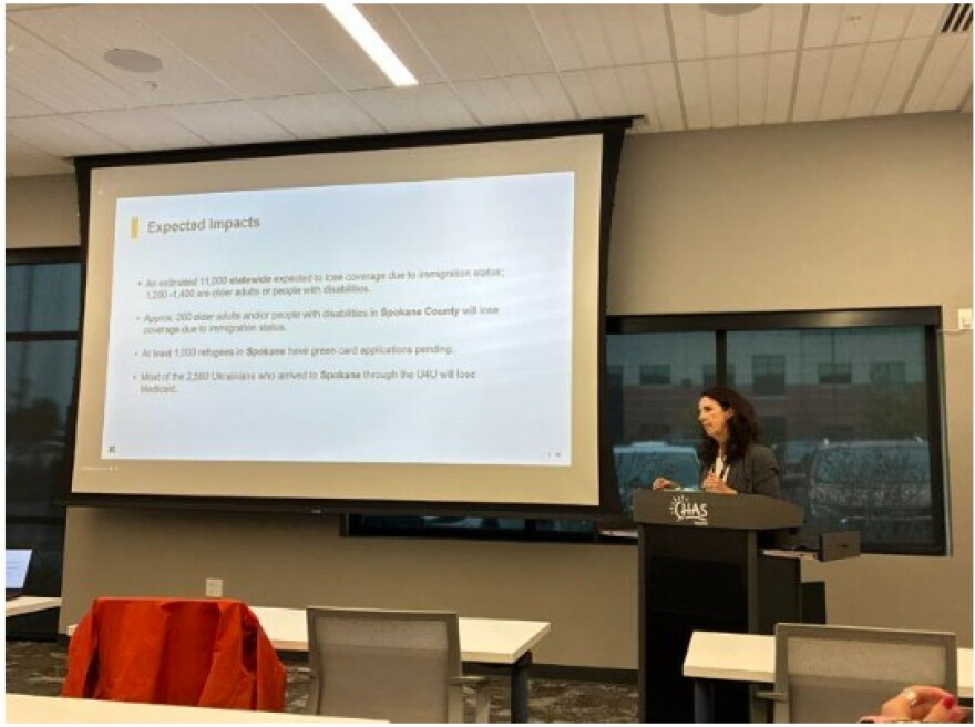 Margaret Hinson, director of the International Rescue Committee in Spokane, presents the statistics she could find on who may lose healthcare coverage after H.R. 1’s refugee federal Medicaid policy changes to take effect Oct. 1.