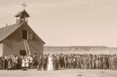 Ramon and Adela (Quintana) Gallegos wedding photograph. Taken in front of the first Santa Rosa Church, Rosa, NM, 1912.