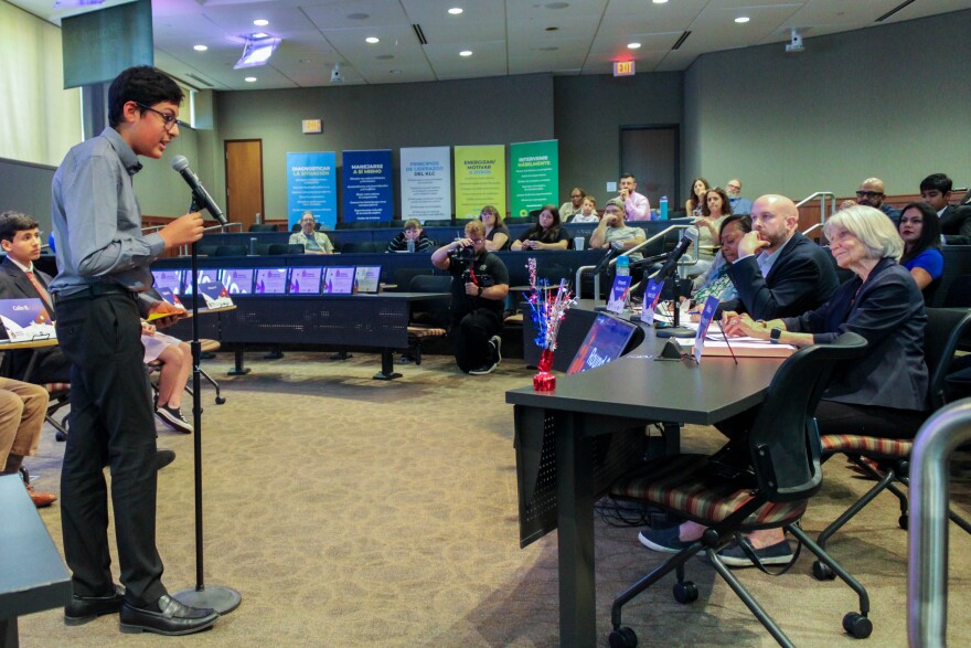 Vihaan Patodia of Robinson Middle School in Wichita presents his idea for reforming the city's transportation system. Patodia was one of five finalists at the Kansas championship civics bee.