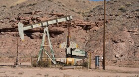 Chapel Hill, UT, USA - October 10th, 2023 - American brand Oil derrick in the Utah desert pumping oil from a well.