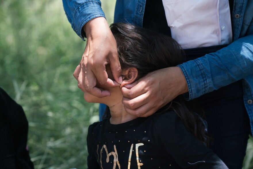Asylum-seekers are asked to remove earrings, hair ties and rosaries.