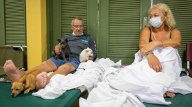 Residents affected by Hurricane Fiona rest at a school being used as a storm shelter in Salinas, Puerto Rico, Monday, Sept. 19, 2022. (AP Photo/Alejandro Granadillo)
