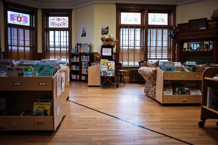 The Haskell Free Library has a piece of black tape along the floor marking the international boundary. "The library staff has to keep a sharp eye on who comes and goes," Scott Wheeler, who publishes a local history magazine, says.