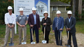 Leaders from Hope Network, Ladder Homes, and Lakeshore Habitat break ground on a new housing project in Holland.