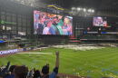 Milwaukee Brewers fans gather at American Family Field to watch the team sweep the Los Angeles Dodgers in Game 4 of baseball's National League Championship Series on Thursday, Oct. 15, 2026. 