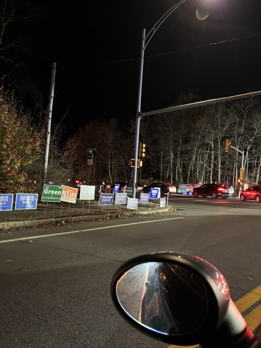 A line of cars waiting to get into the Londonderry polling place this evening.