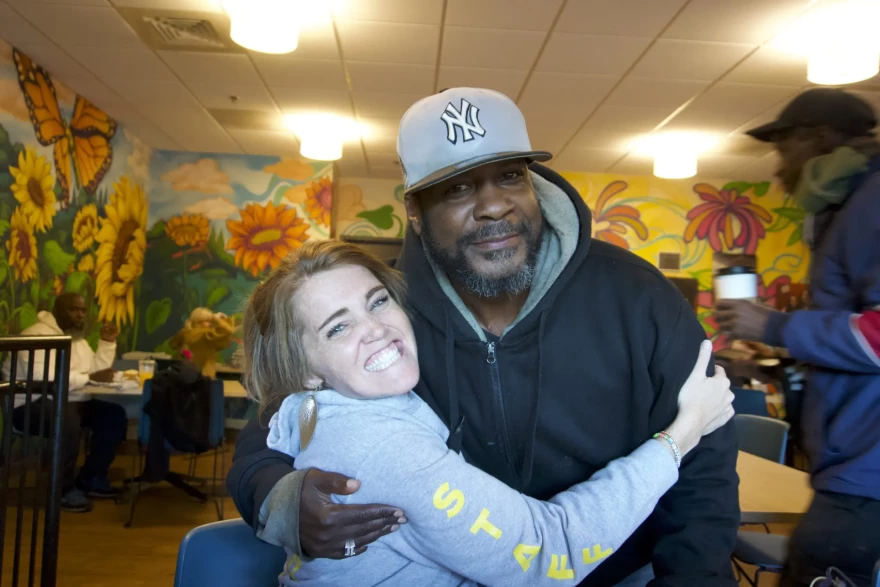 A Place at the Table founder and executive director Maggie Kane is pictured with a frequent customer and volunteer.