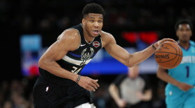 Milwaukee Bucks forward Giannis Antetokounmpo in action during NBA game against Charlotte Hornets. (Thibault Camus/AP)