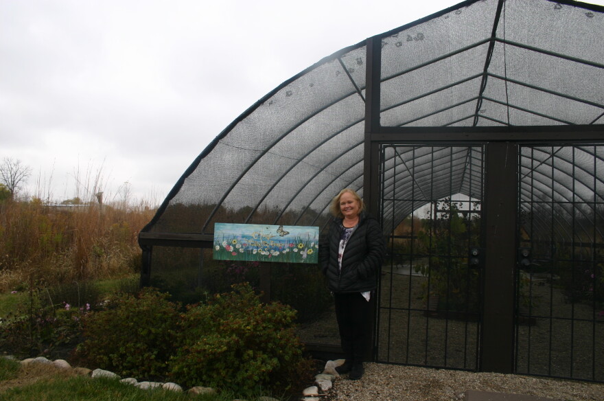 Cedar Springs Pavilion Owner Lisa Brannon stands in front of the butterfly house on her property on a chilly day in late October. Trump campaign surrogate Eric Trump spoke at the pavilion later that day.